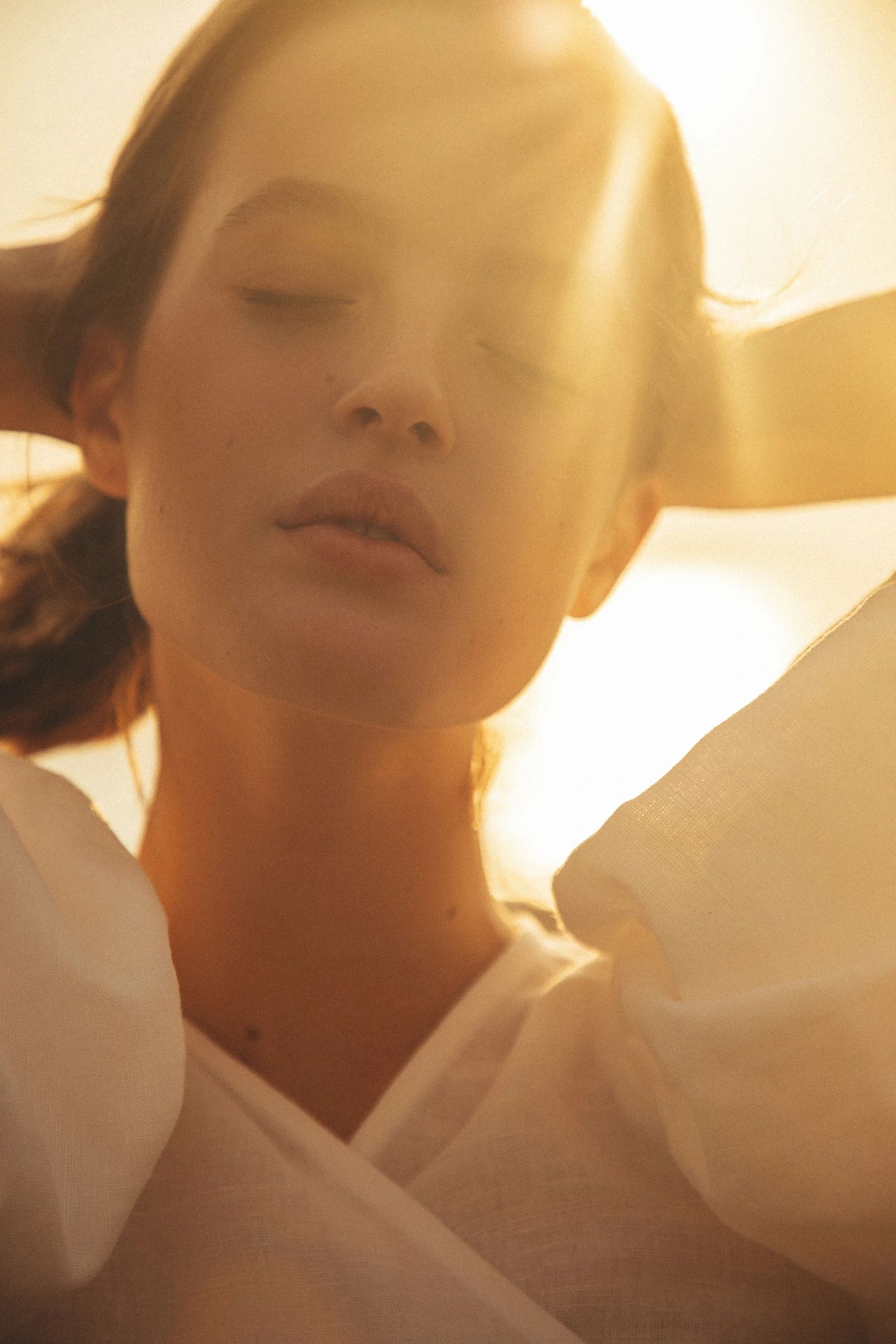 Sunlit editorial portrait outdoors