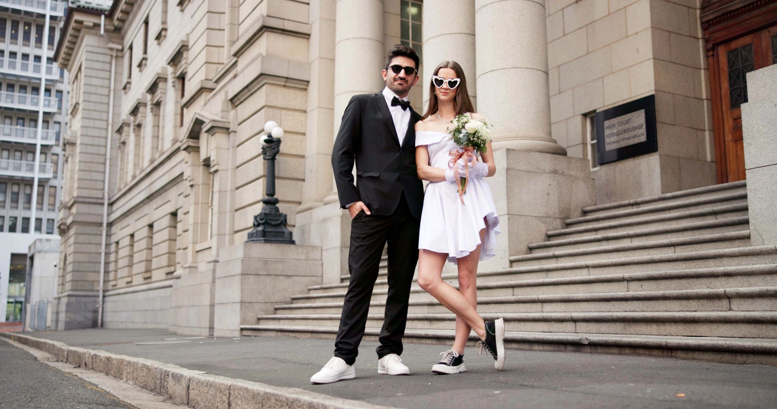 Bride and groom portrait on a city street