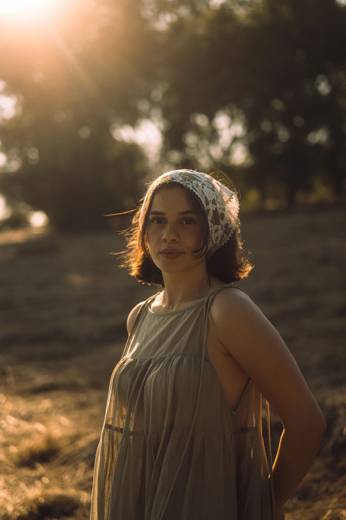 Portrait at sunset in an open field