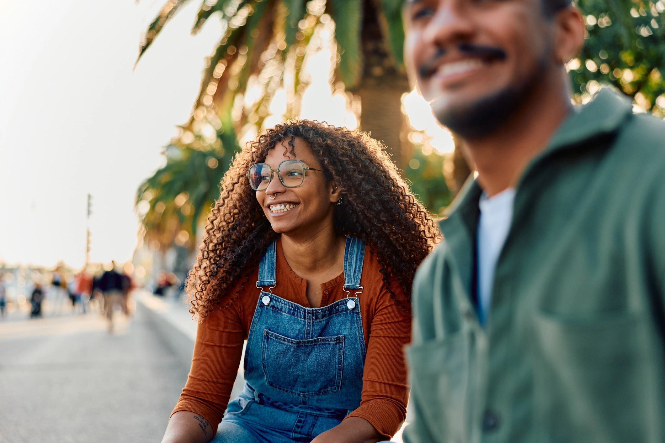 Young couple smiling outdoors