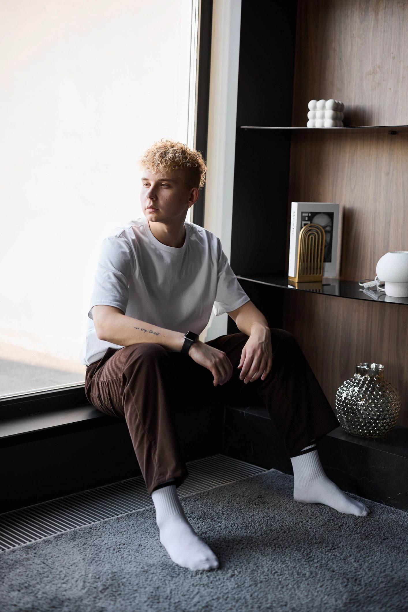 Editorial portrait by window