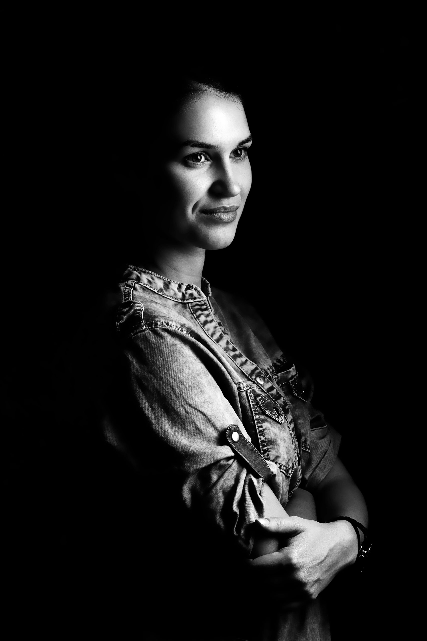 Studio portrait of woman with soft fashion styling